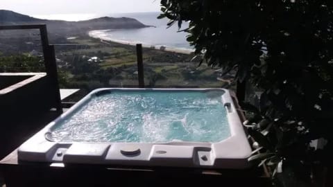 Spa ao pôr do sol com vista para o mar